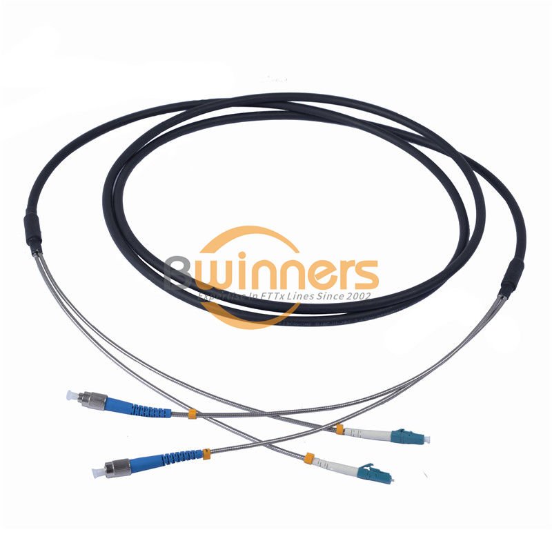 Cordón de conexión de fibra blindada